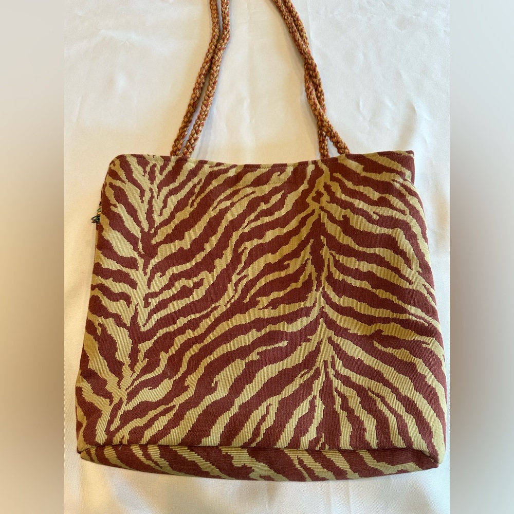 Stylish Maroon and Tan Zebra Tote Bag with Tassel Detail - Picture 4 of 10